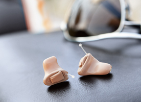 Small almost invisible in the ear hearing aids